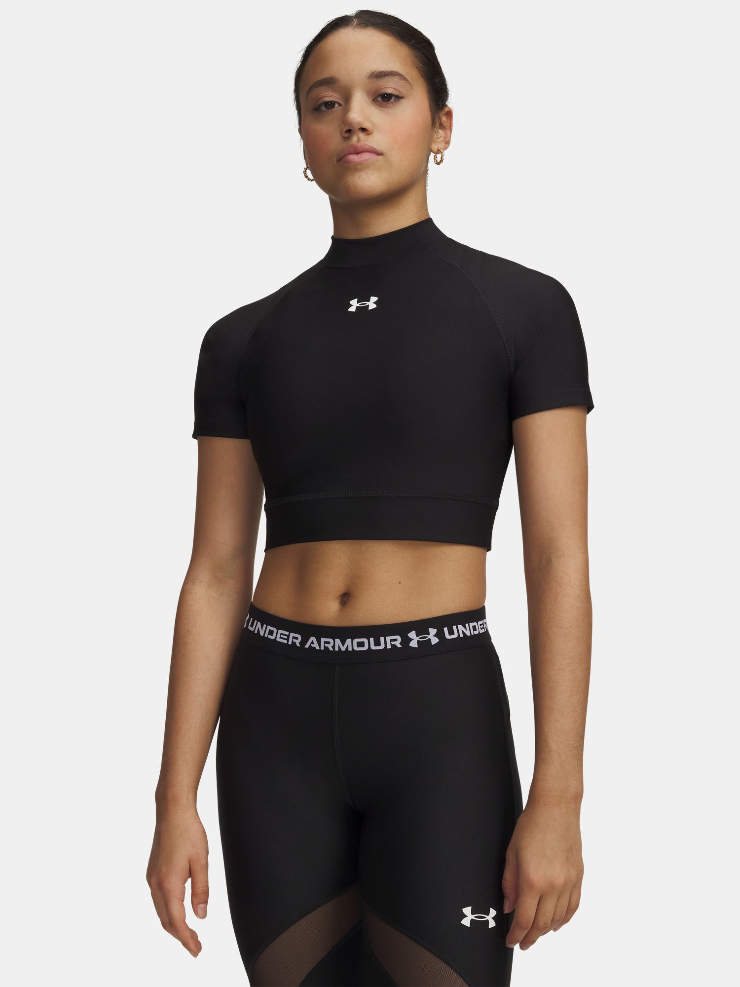 Nõi Under Armour HeatGear Crop Mock SS-BLK póló