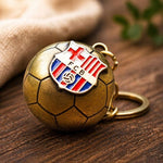 FC Barcelona original licensed keychain in the shape of a golden with the coat of arms złoty labda B7081