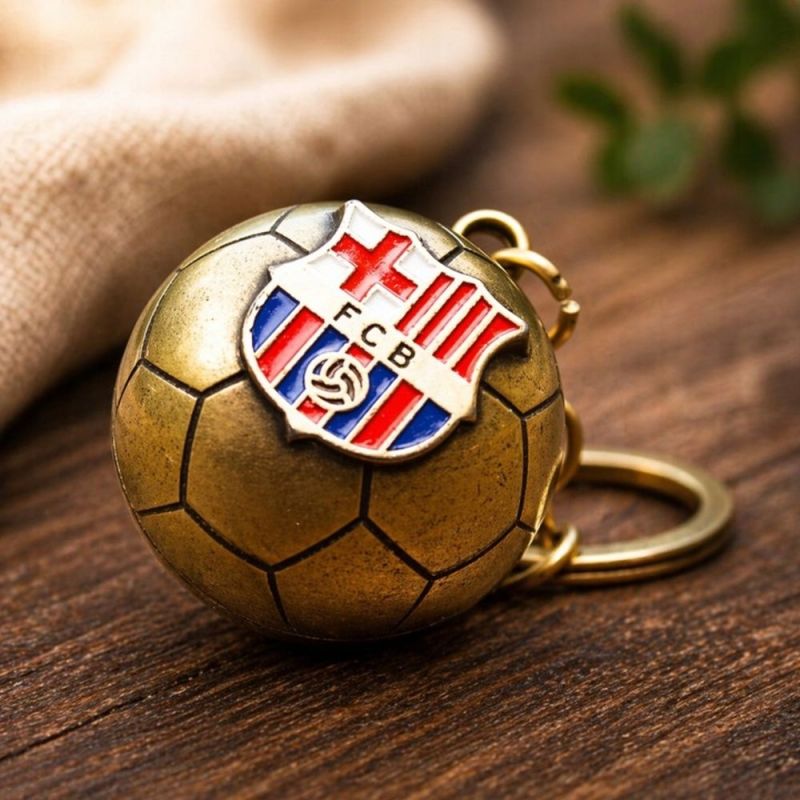FC Barcelona original licensed keychain in the shape of a golden with the coat of arms złoty labda B7081
