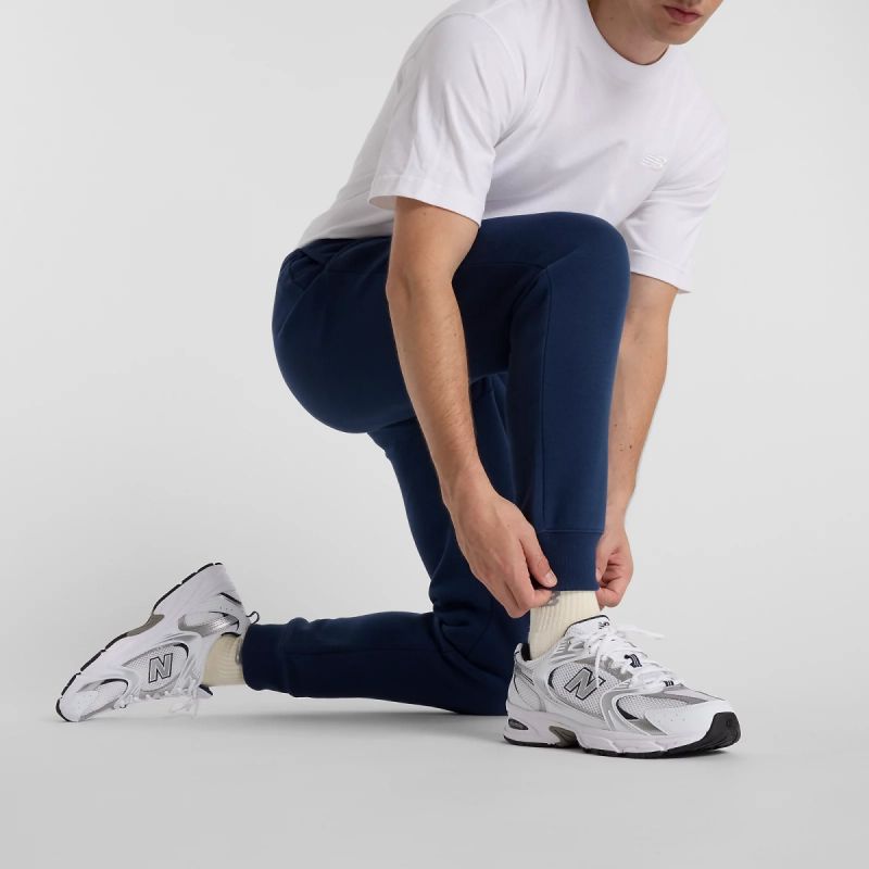 New Balance Sport Graphic Fleece Jogger M MP51940NNY nadrág