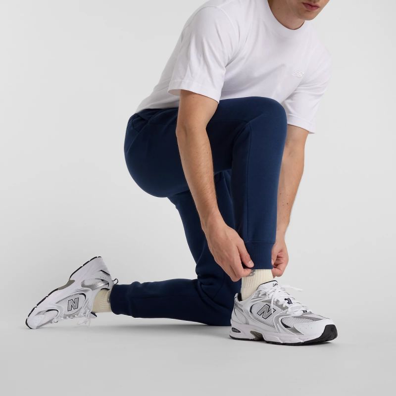 New Balance Sport Graphic Fleece Jogger M MP51940NNY nadrág