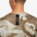 Nike_ Nike Dri-FIT Miler-Men\'s Short-Sleeve Camo Running Top Póló - Sportmania.hu