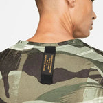 Nike_ Nike Dri-FIT Miler-Men\'s Short-Sleeve Camo Running Top Póló - Sportmania.hu